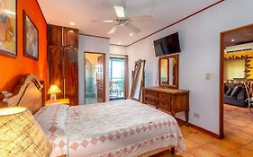 Warm Interiors And Orange Hues On Ground Floor In Front Of Beach