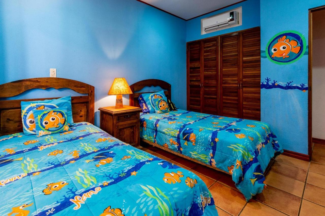 Warm Interiors And Orange Hues On Ground Floor In Front Of Beach Playa Flamingo Exterior photo