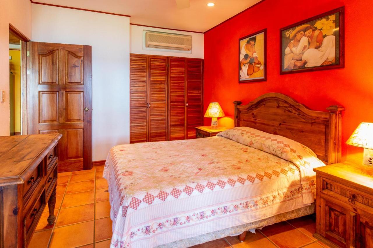 Warm Interiors And Orange Hues On Ground Floor In Front Of Beach Playa Flamingo Exterior photo